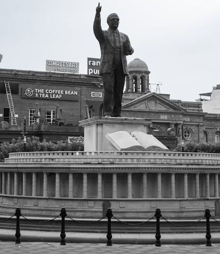 A monochrome image of a historical statue in Amritsar, Punjab, highlighting cultural heritage.